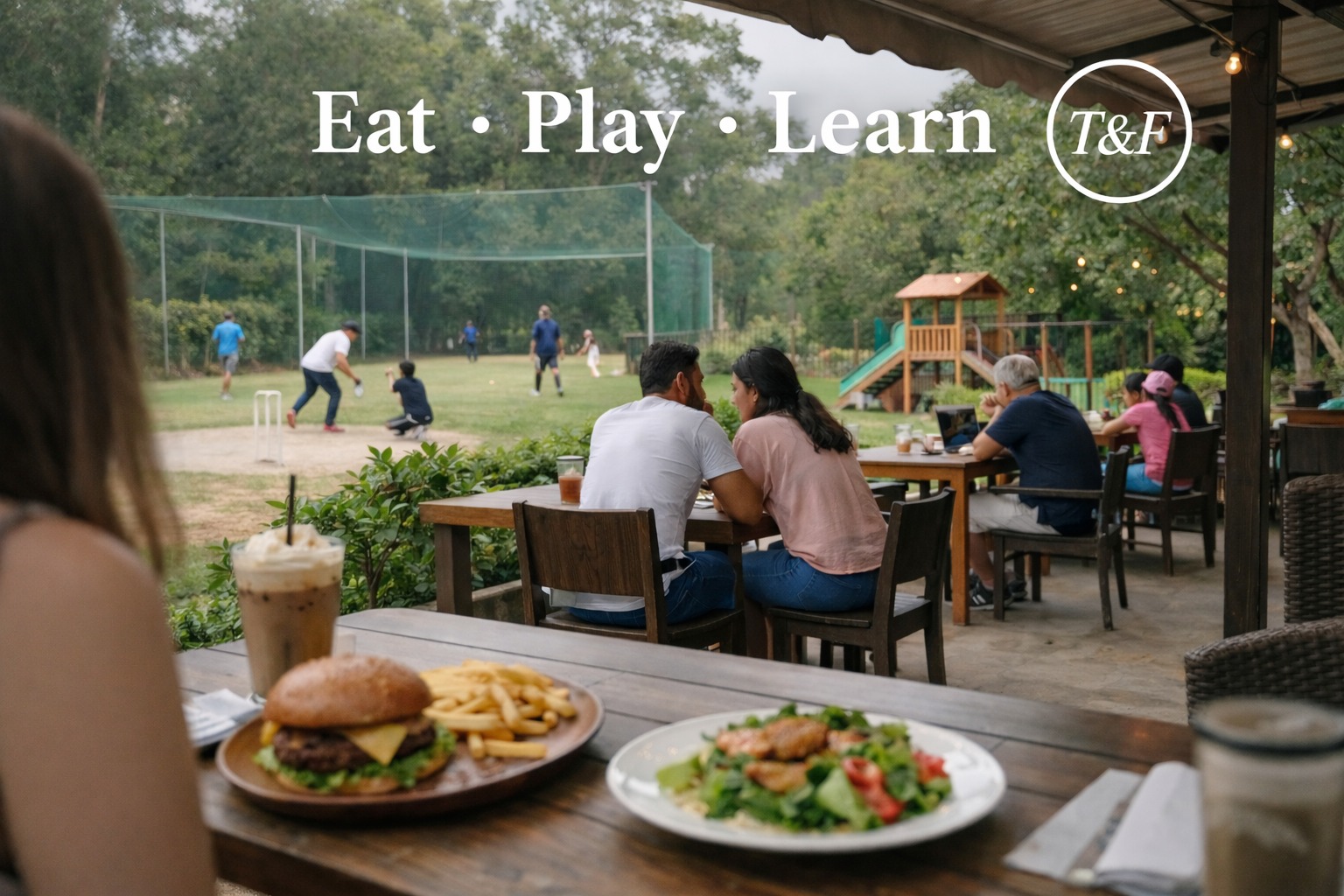 Cafe dining overlooking sports and children's play areas